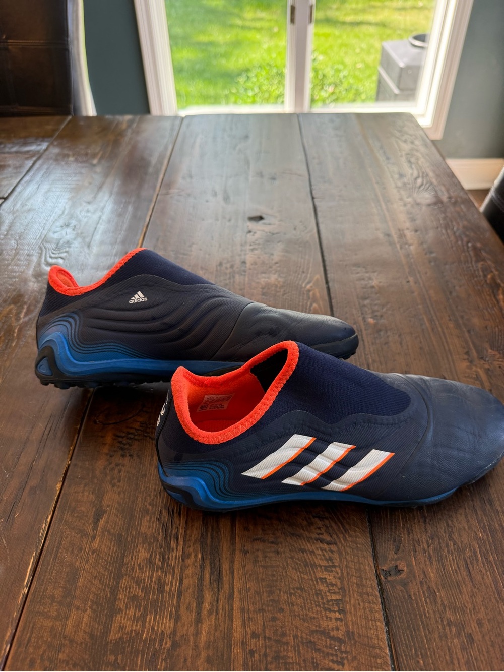 COPA adidas Navy Athletic Soccer Shoes with Orange Trim